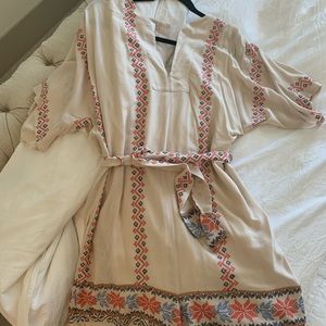 Embroidered romper. Never worn.